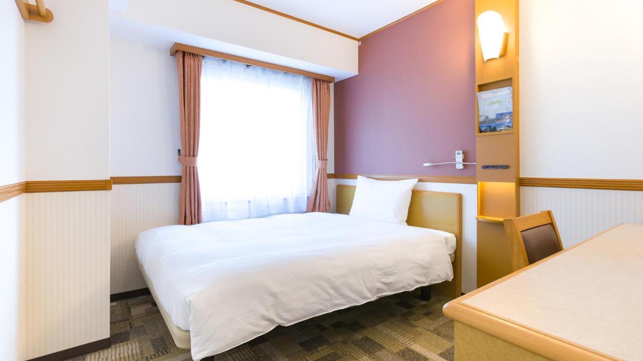 Toyoko Inn Tokyo Shinagawa-Eki Takanawa-Guchi מראה חיצוני תמונה